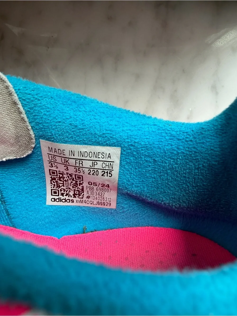 adidas Kids INDOOR soccer cleats with Pink Pattern and Blue Accents